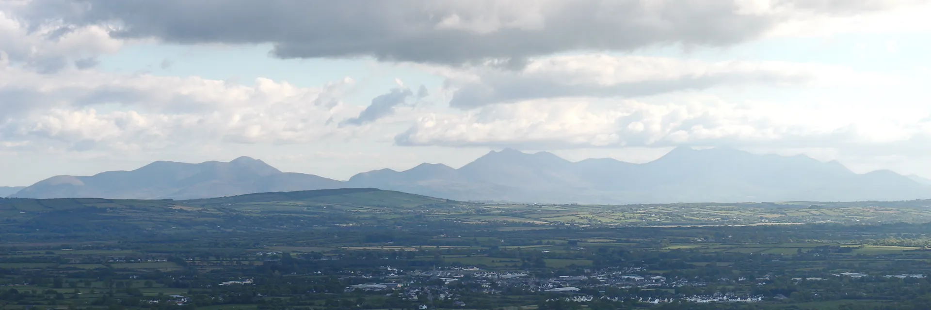 A wide mountain and valley landscape in Killarney National Park, County Kerry.